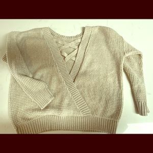 Super cute open back sweater. NWOT